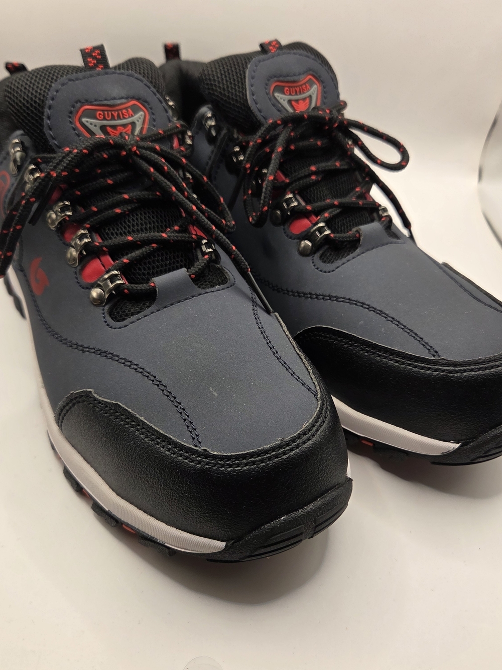 GUYISA gray and black safety work boots with a steel toe cap